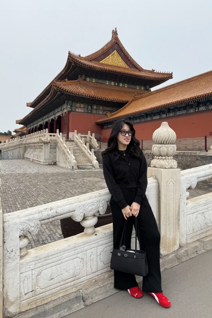 Black Zip-Up Hoodie + Black Wide-Leg Trousers + Red Sneakers