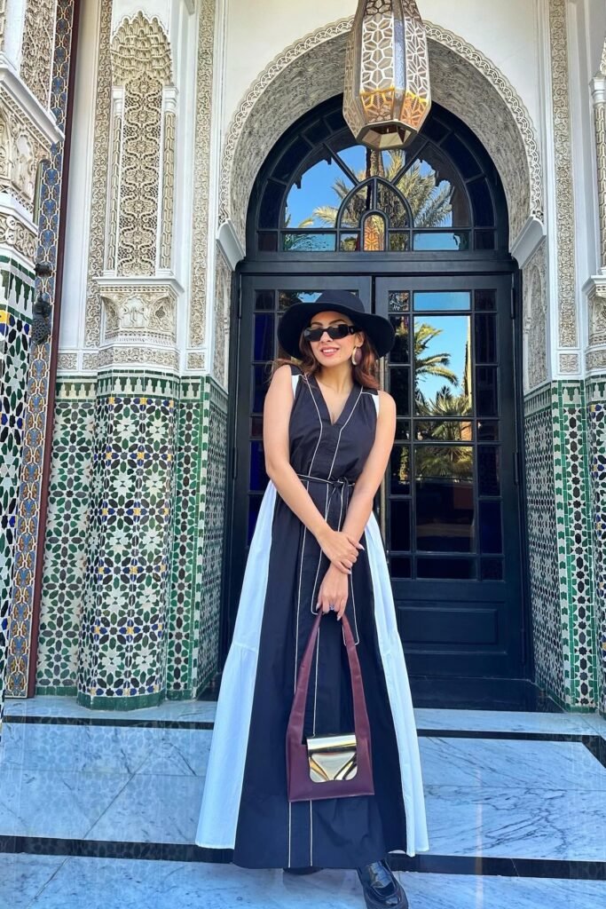 Black and White Color-Block Maxi Dress + Black Wide-Brim Hat + Burgundy Bag