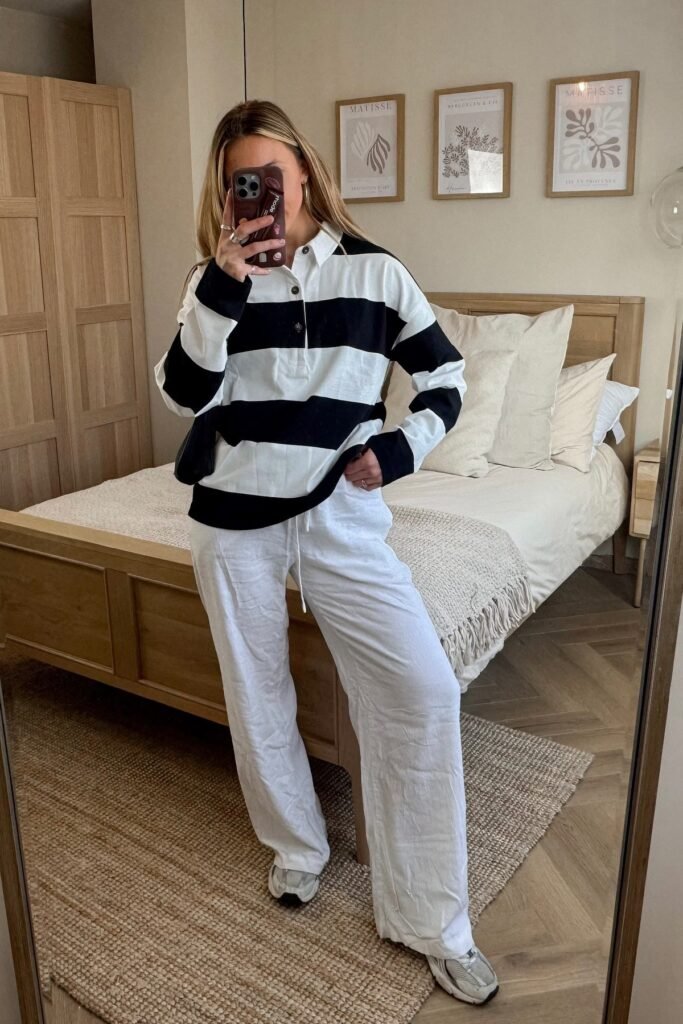 Black and White Striped Polo + White Wide-Leg Trousers + Silver Sneakers