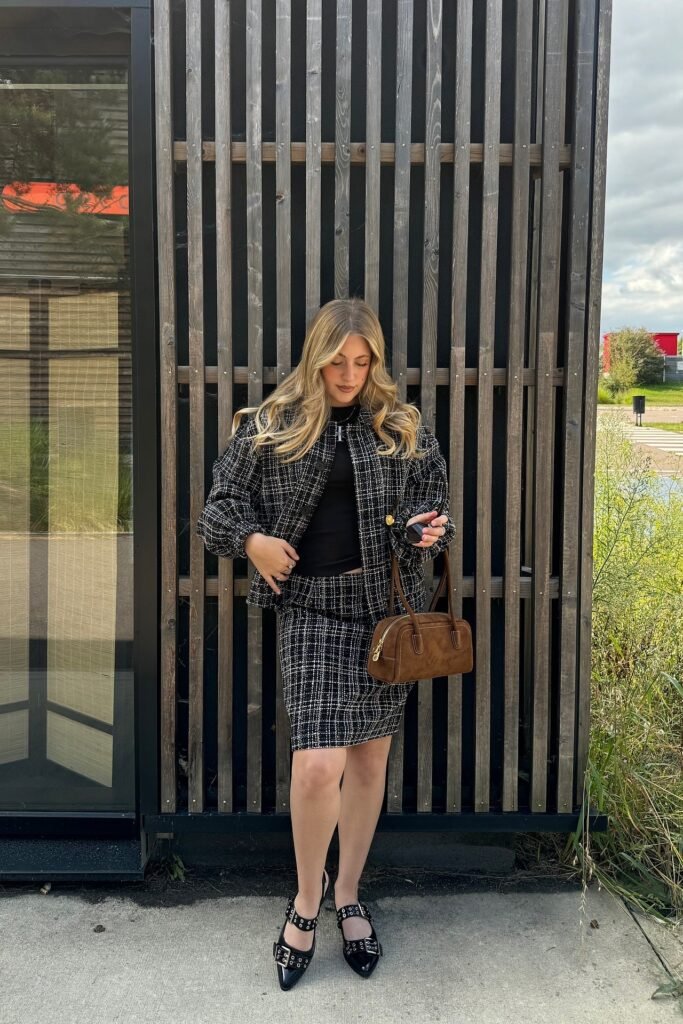 Black and White Tweed Jacket and Matching Skirt + Black Mock Neck Top + Black Buckled Pointed Toe Flats