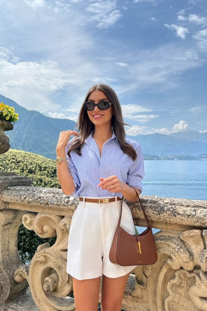 Blue Pinstriped Button Down + White High Waisted Shorts + Brown Leather Belt + Brown Shoulder Bag