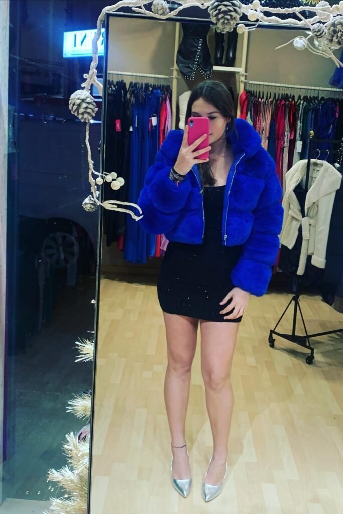 Bright Blue Faux Fur Puffer Jacket + Black Mini Dress + Silver Pointed-Toe Heels