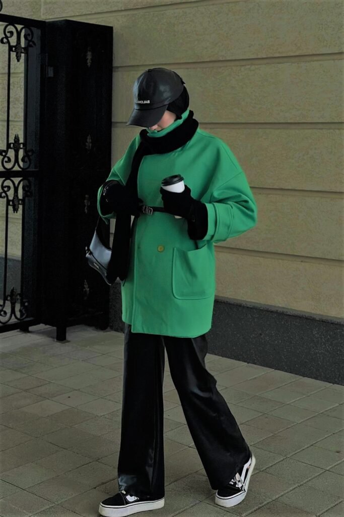 Bright Green Oversized Coat + Black Wide-Leg Trousers + Black Scarf & Gloves + Black and White Sneakers