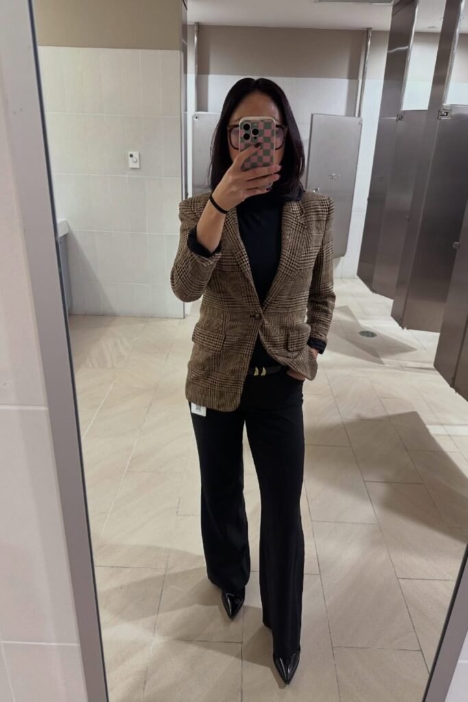 Brown Plaid Blazer + Black Mock-Neck Top + Black Flared Trousers + Black Pointed Patent Leather Heels