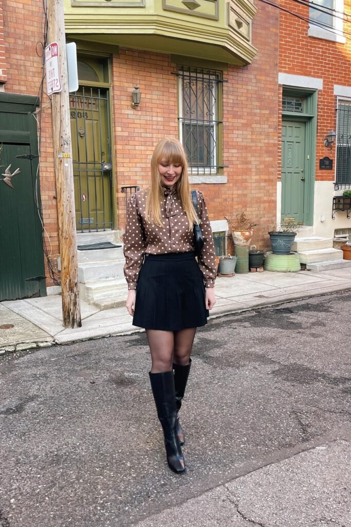 Brown Polka Dot Blouse + Black Pleated Mini Skirt + Black Knee-High Boots