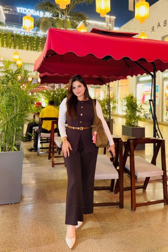 Brown Sleeveless Button-Up Vest + White Long-Sleeve Undershirt + Brown Flare Trousers + Cream Pointed Flats