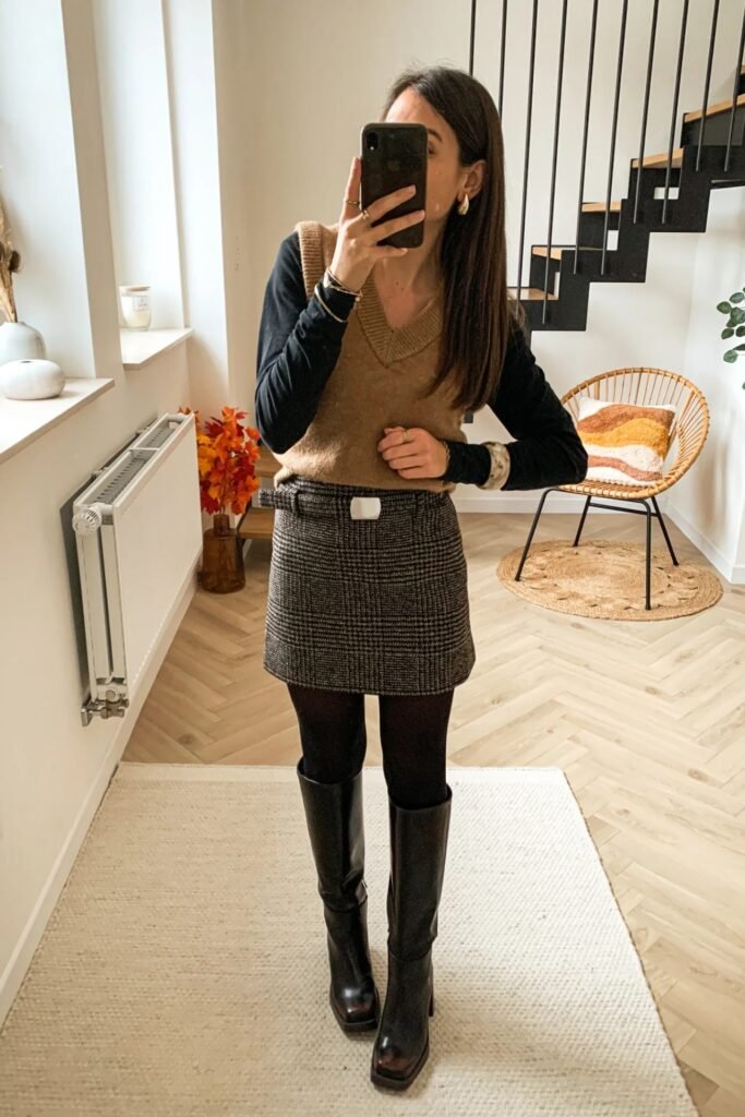 Brown V-Neck Sweater Vest + Black Long-Sleeve Shirt + Plaid Mini Skirt + Black Knee-High Boots