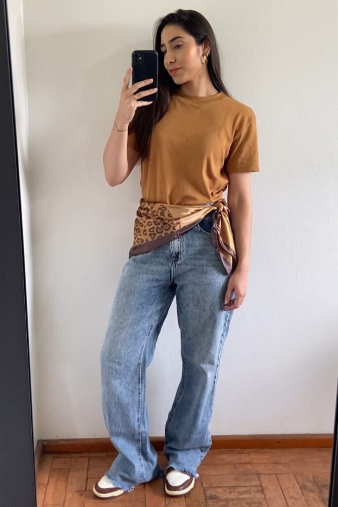 Camel T-Shirt + Light Wash Flare Jeans + Brown & White Sneakers + Leopard Print Scarf Belt