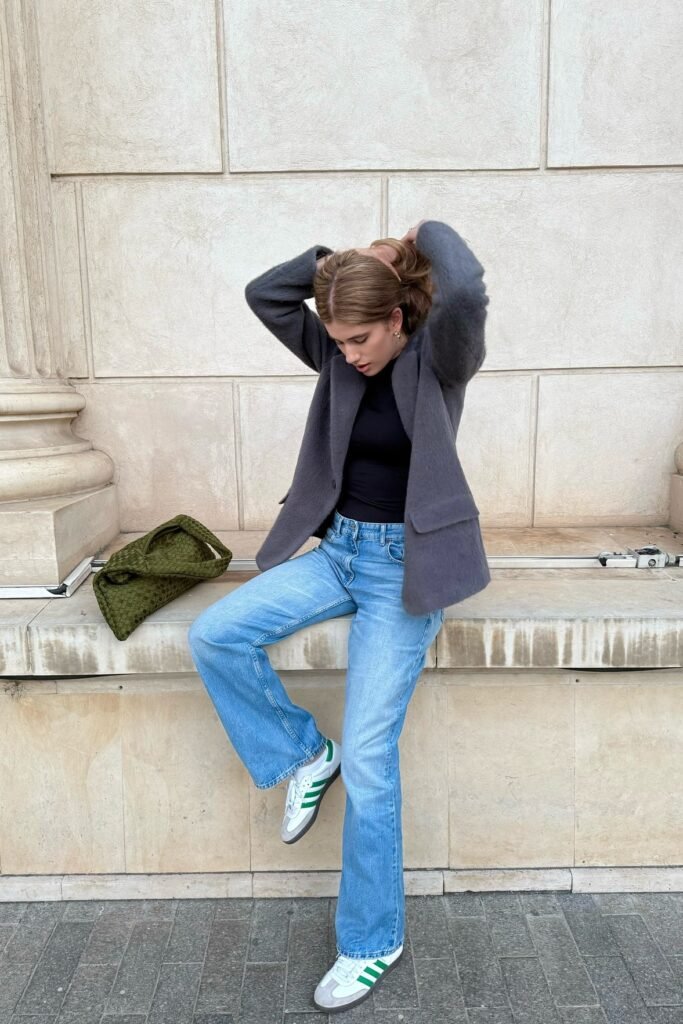 Charcoal Oversized Wool Blazer + Black Bodysuit + Light Wash Wide Leg Jeans + White and Green Sneakers