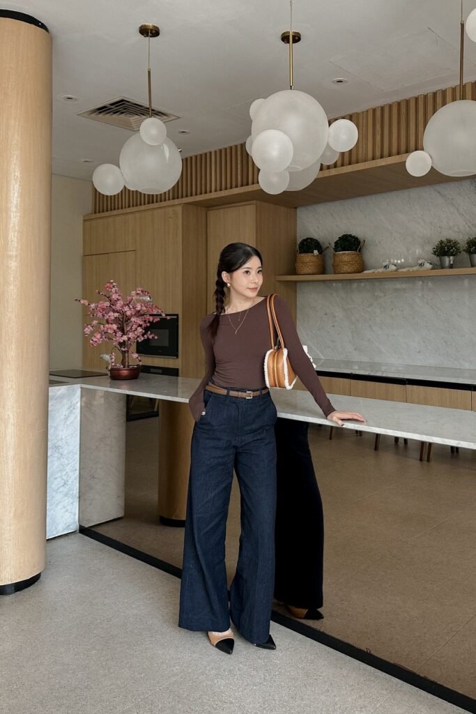 Chocolate Brown Long Sleeve Bodysuit + Dark Wash Wide Leg Jeans + Brown Leather Belt + Tan Shearling Trim Bag