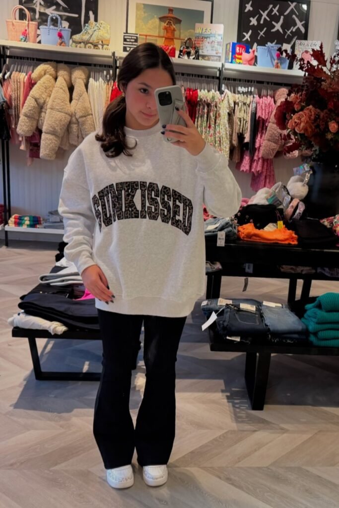 Cozy Grey Sweatshirt + Black Flared Jeans + White Sneakers