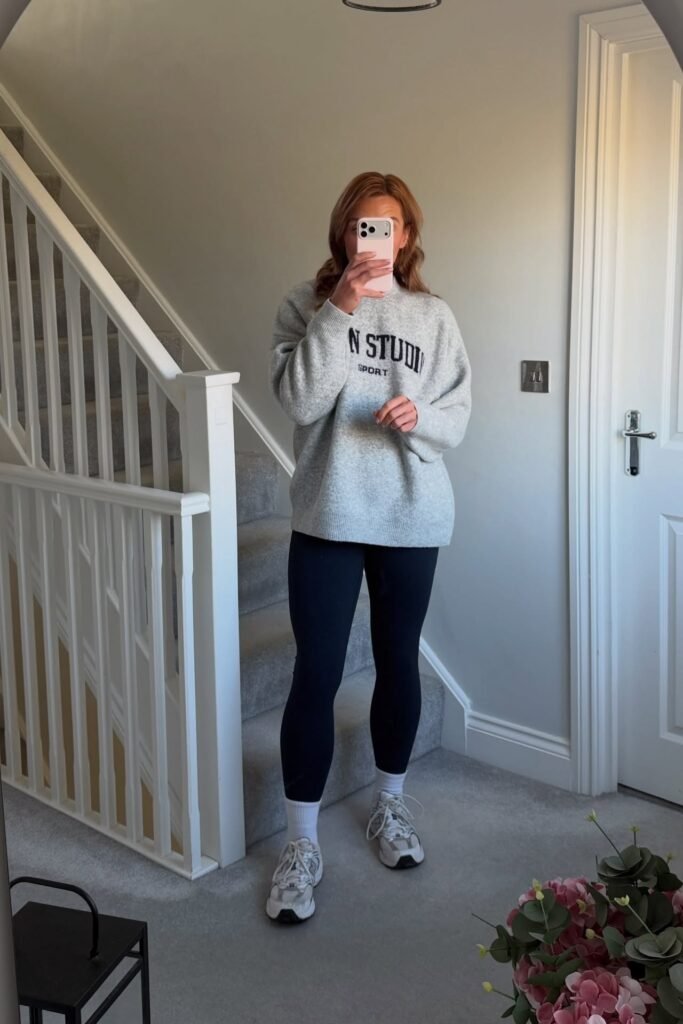 Cozy Grey Sweatshirt + Black Leggings + White Crew Socks + Grey Athletic Sneakers