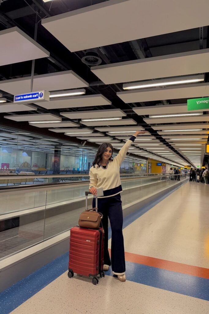 Cream & Navy Colorblock Sweater + Navy Wide-Leg Pants + Beige Loafers