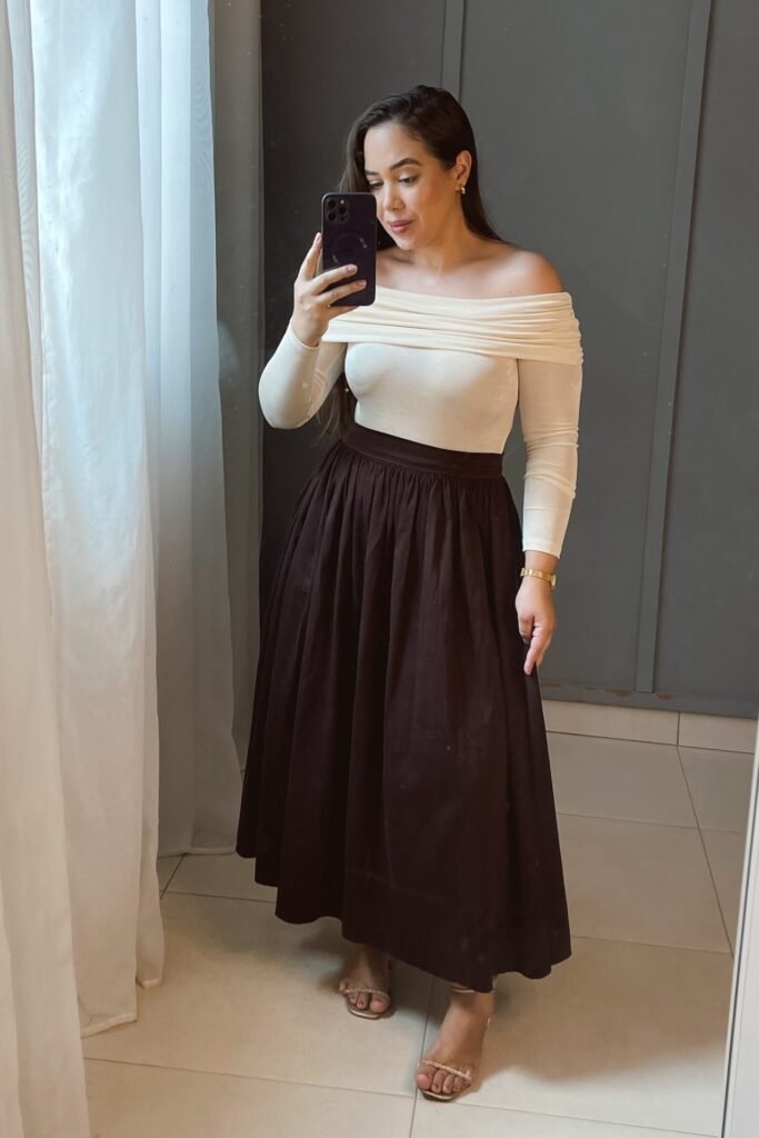 Cream Off-the-Shoulder Long Sleeve Top + Dark Brown Pleated Maxi Skirt + Embellished Sandals