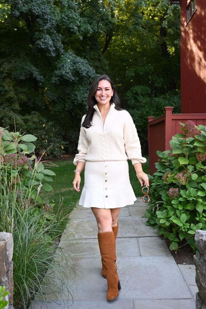 Cream Quarter Zip Cable Knit Sweater + White Button Down Ruffle Skirt + Tan Knee High Boots