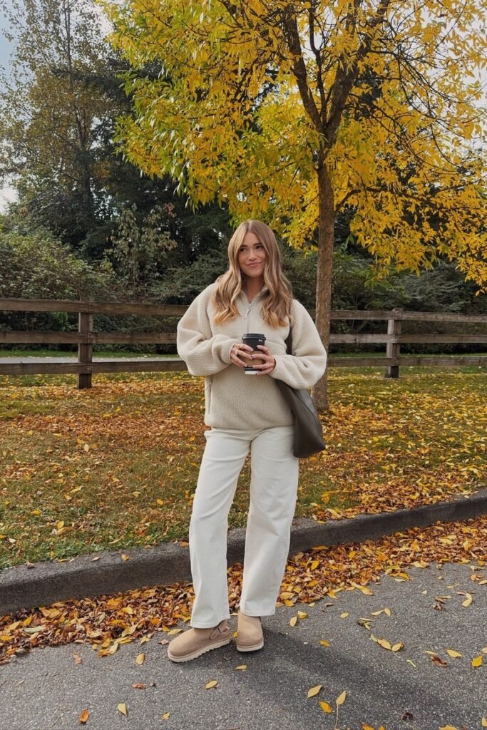 Cream Quarter-Zip Fleece + White Straight-Leg Jeans + Tan Shearling Boots + Olive Tote Bag