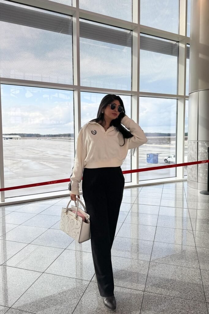 Cream Quarter-Zip Pullover + Black Straight-Leg Trousers + Grey Pointed-Toe Boots