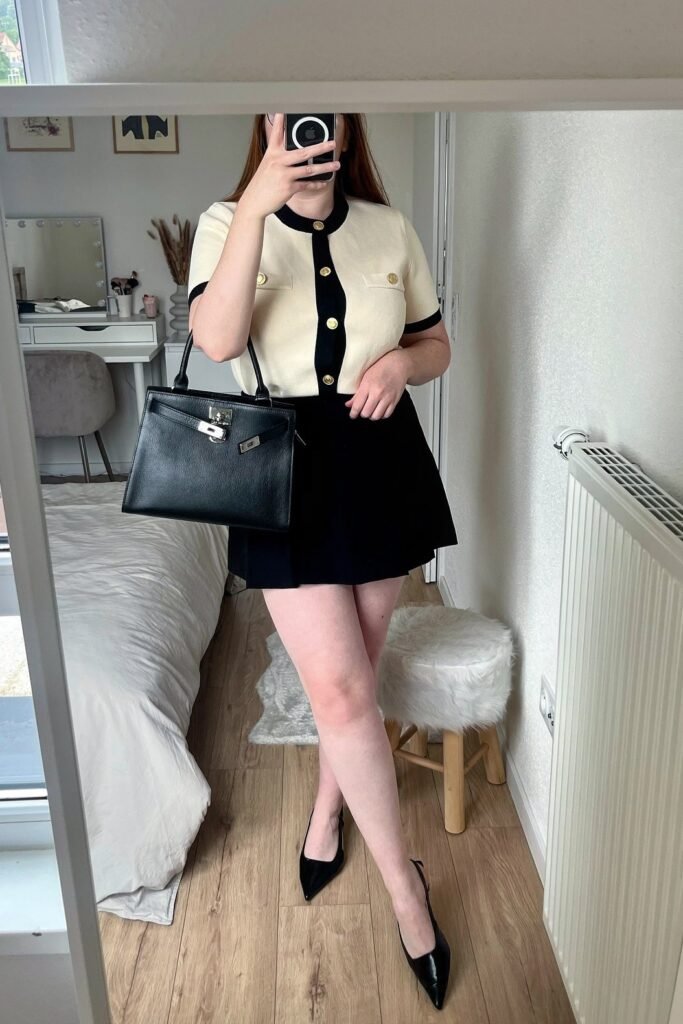 Cream Short Sleeve Cardigan with Black Contrast + Black Pleated Mini Skirt + Black Pointed Slingback Heels