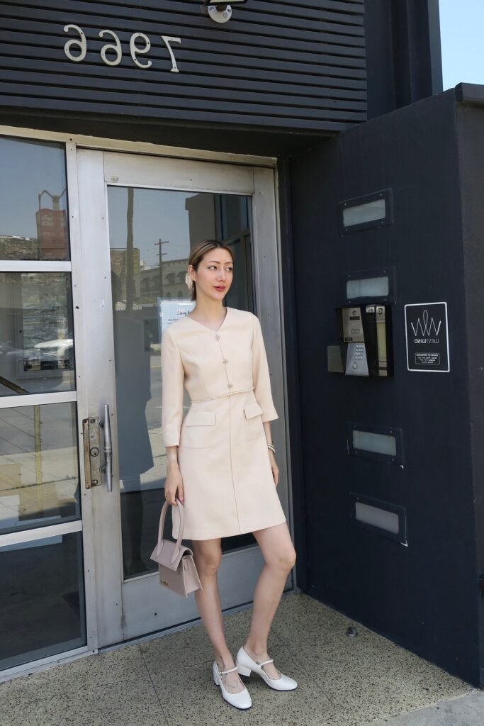 Cream Structured Mini Dress + Taupe Top Handle Bag + White Mary Jane Heels