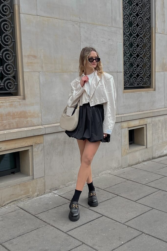 Cropped White Jacket + Black Bubble Mini Skirt + Black Loafers with Socks