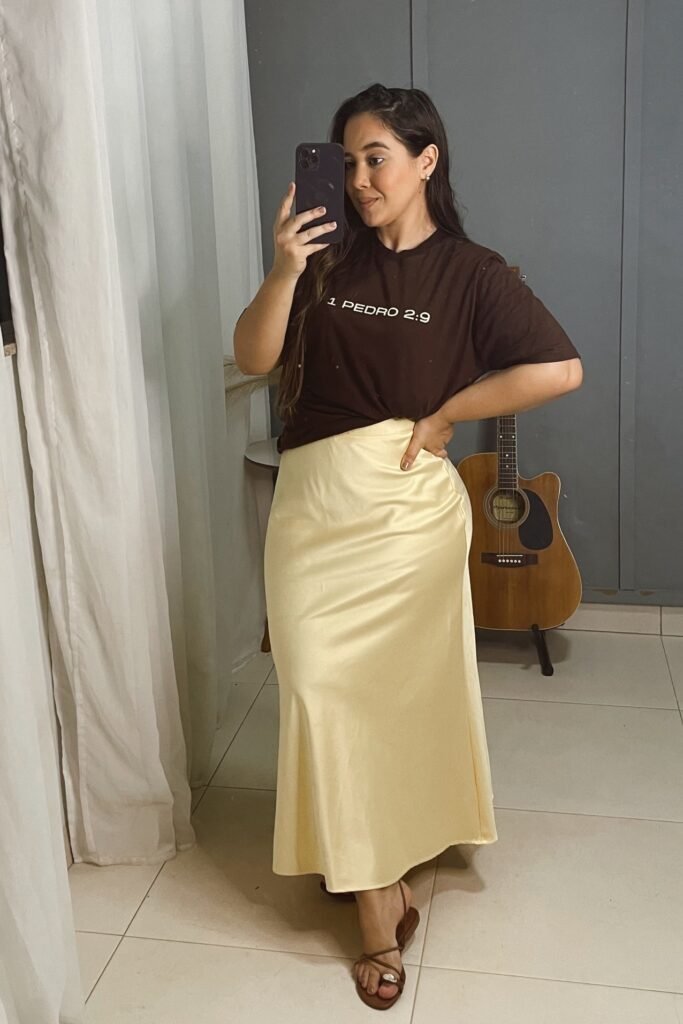 Dark Brown Graphic T-Shirt + Pale Yellow Satin Maxi Skirt + Brown Strappy Sandals