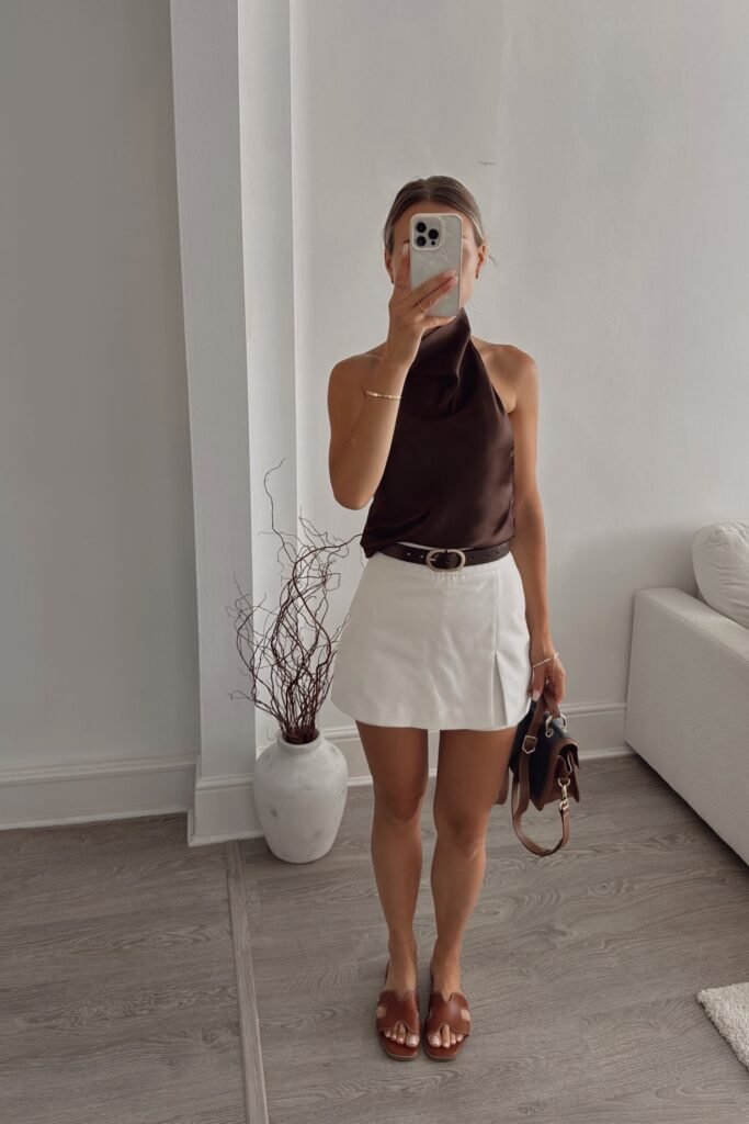Dark Brown Satin Halter Top + White Pleated Mini Skirt + Brown Leather Slides