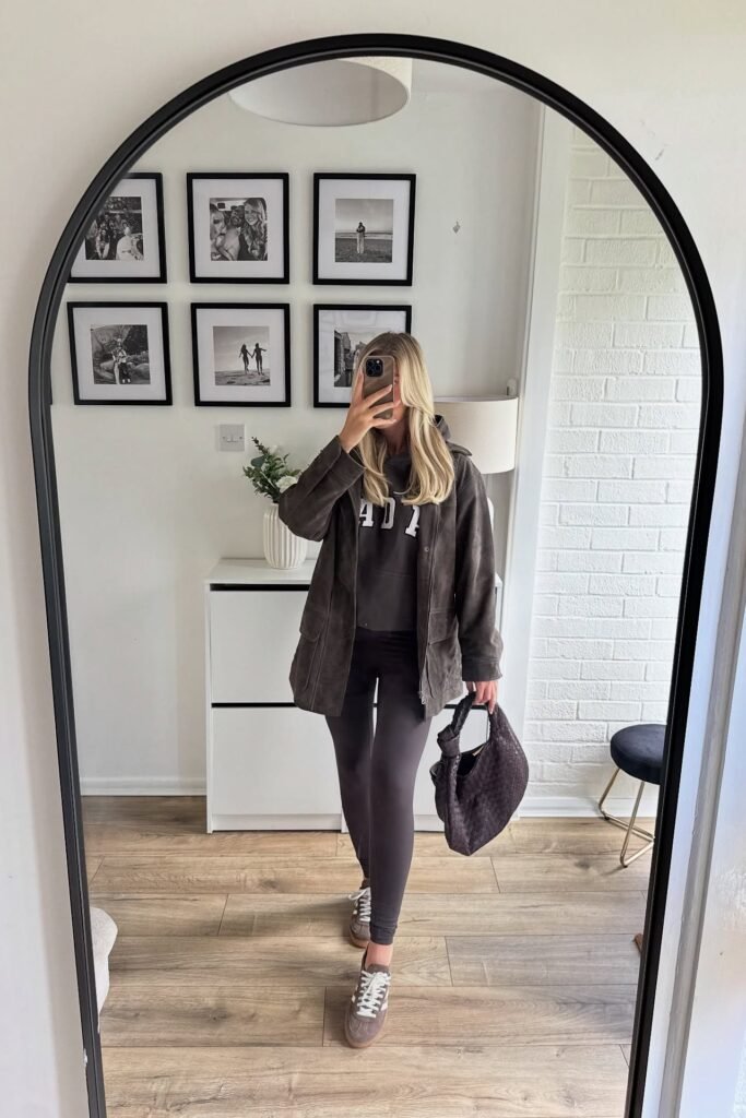 Dark Grey Utility Jacket + Charcoal Graphic Hoodie + Dark Grey Leggings + Brown and White Sneakers