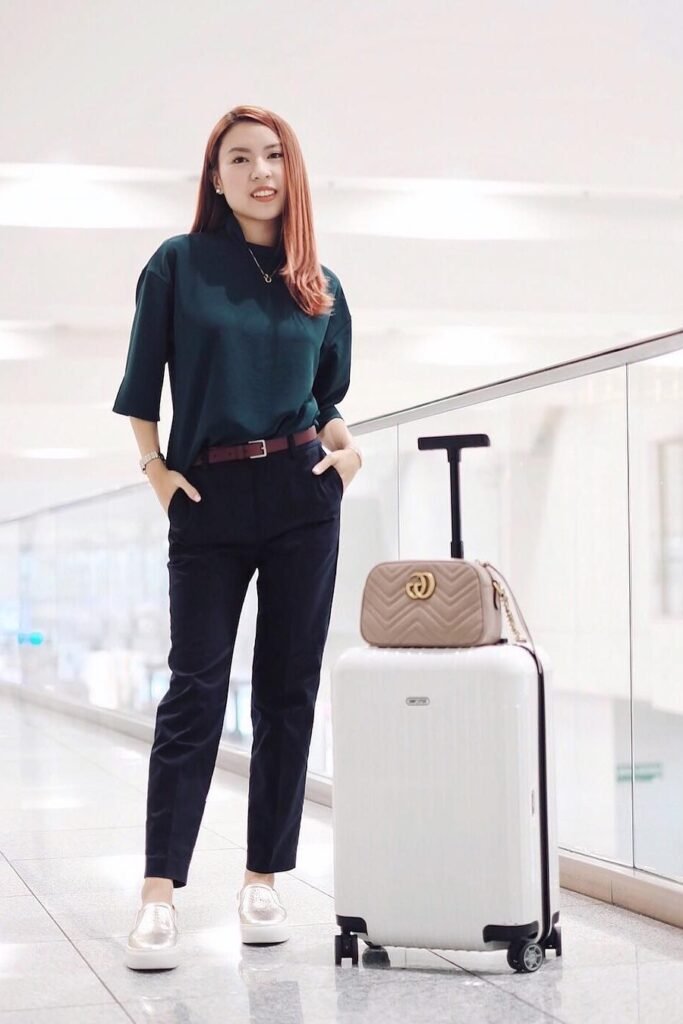 Dark Teal Mock-Neck Blouse + Black Tapered Trousers + Silver Slip-on Sneakers