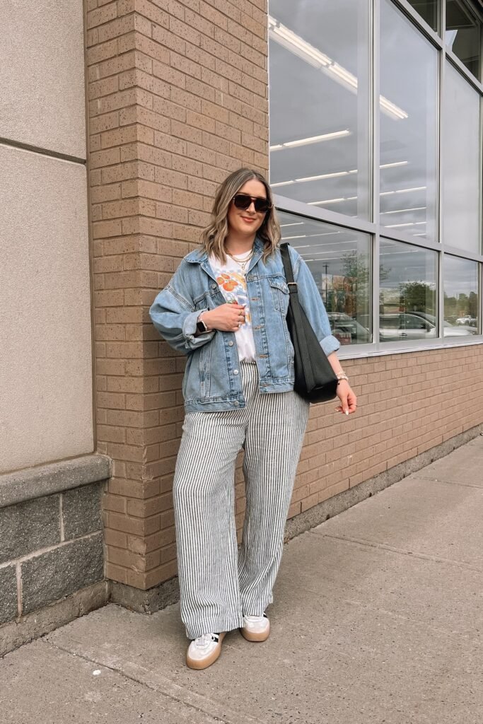 Denim Jacket + Graphic T Shirt + Black and White Striped Pants + White Adidas Samba Sneakers