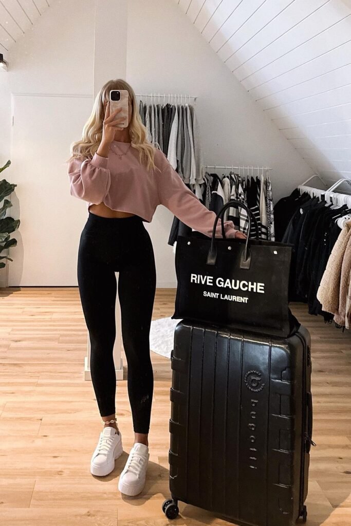 Dusty Pink Cropped Sweatshirt + High-Waisted Black Leggings + White Chunky Sneakers