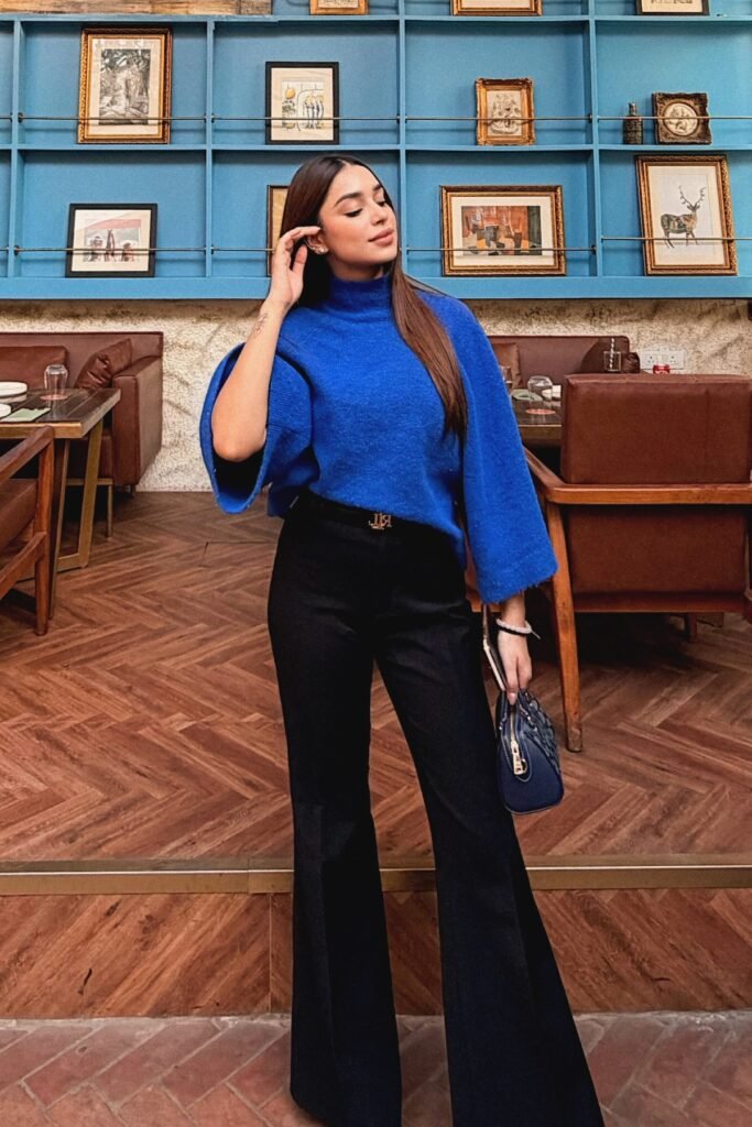 Electric Blue Bell Sleeve Sweater + Black High Waisted Flared Trousers + Navy Handbag