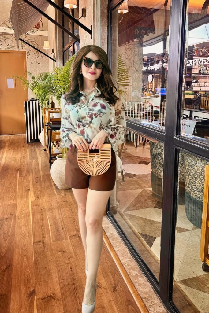 Floral Chiffon Blouse + Brown Tailored Shorts + Bamboo Ark Bag + White Pumps