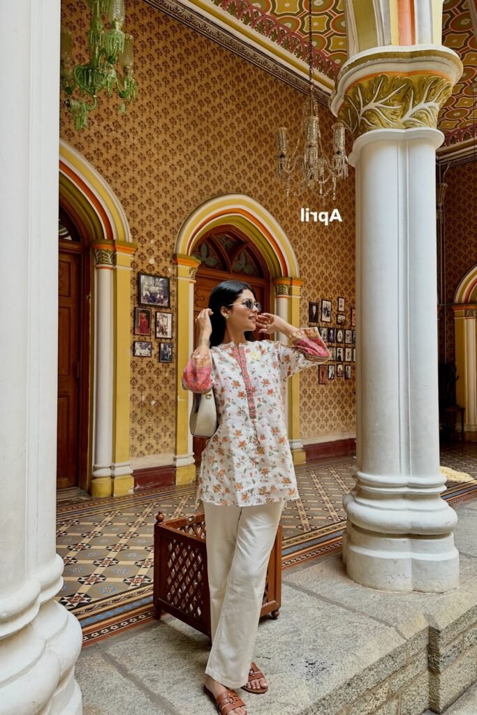 Floral Print Tunic + White Straight-Leg Trousers + Brown Leather Slides