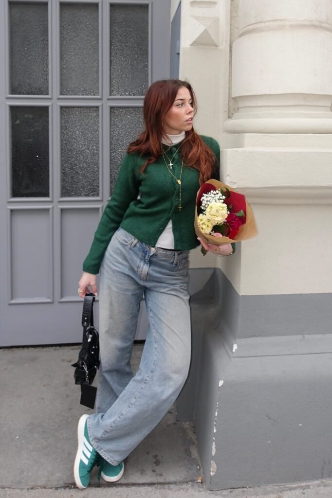 Forest Green Cardigan + White Turtleneck + Light Wash Wide-Leg Jeans + Green Sneakers