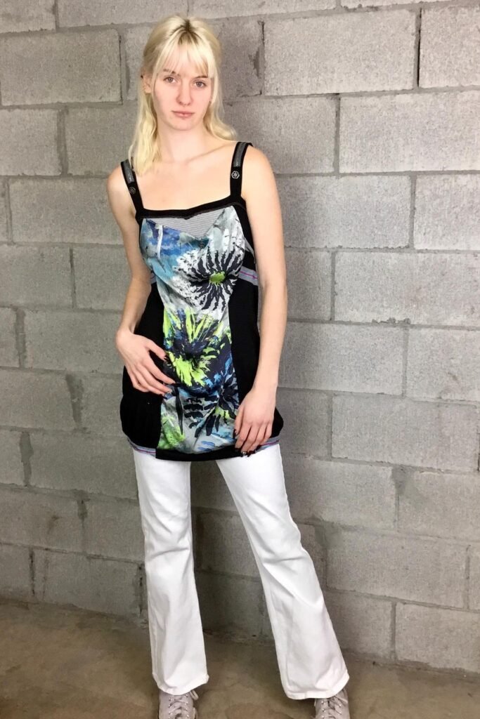 Graphic Print Floral Tunic + White Flared Trousers + Light Grey Sneakers