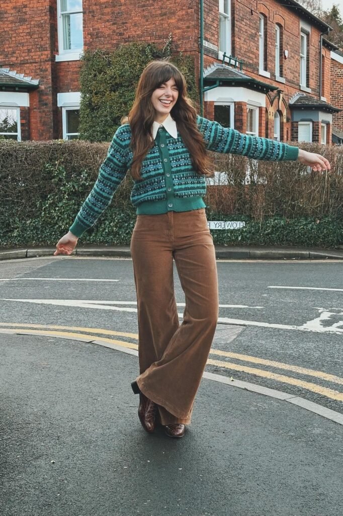 Green Patterned Cardigan + Brown Flared Corduroy Pants + Brown Leather Boots