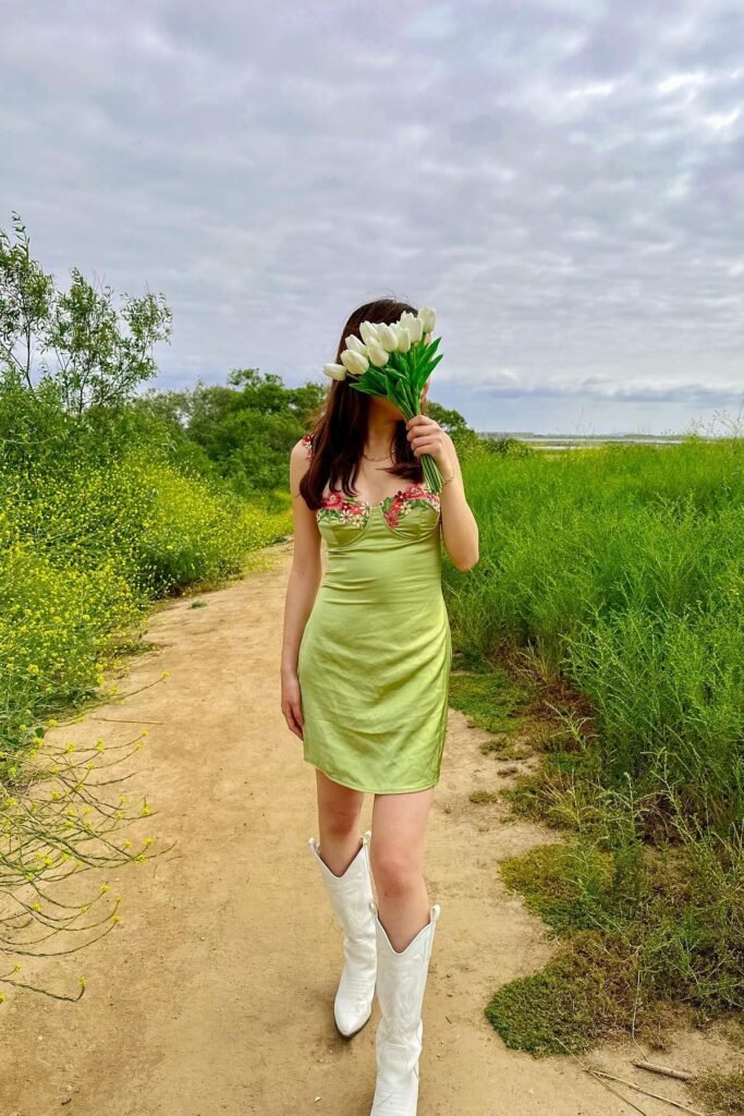 Orange Polka Dot Tiered Maxi Dress + Black Patterned Western Boots + Cow-Print Tote Bag