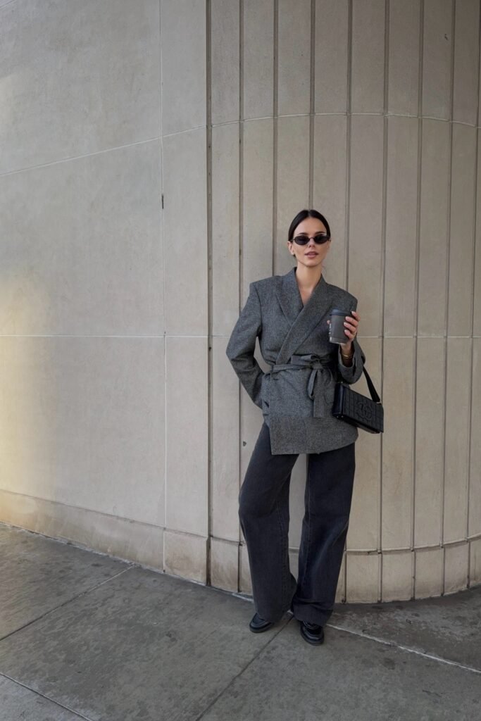 Grey Belted Wrap Blazer + Dark Charcoal Wide-Leg Jeans + Black Chunky Loafers + Black Shoulder Bag