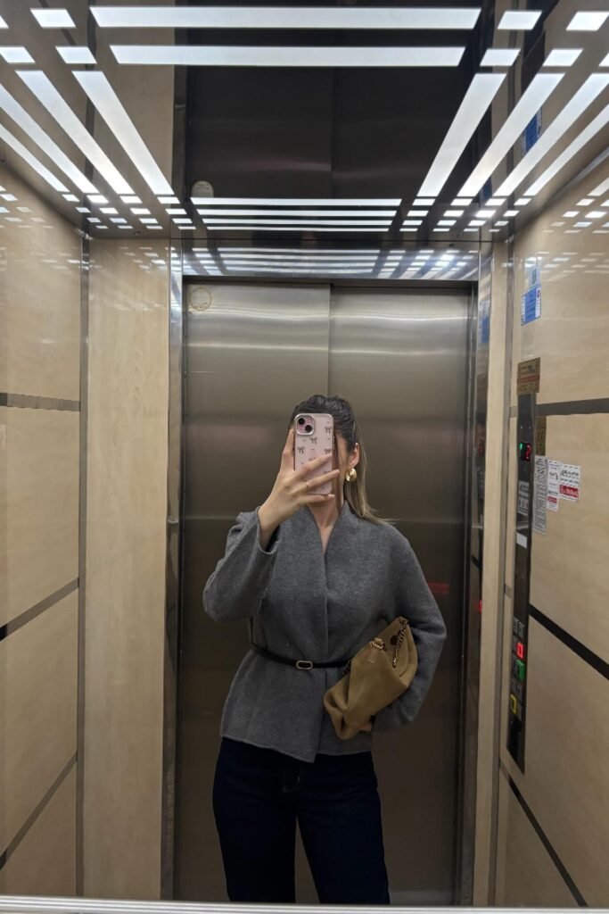 Grey Belted Wrap Jacket + Dark Skinny Jeans + Tan Leather Clutch