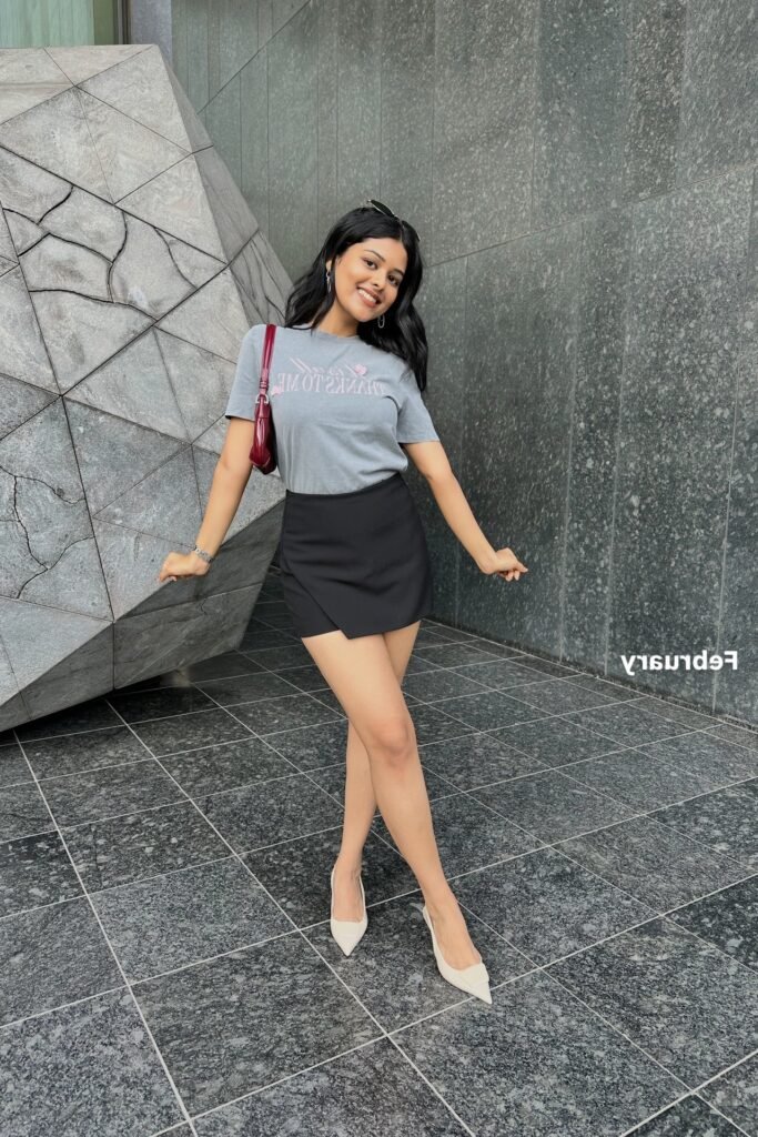 Grey Graphic T-Shirt + Black Mini Wrap Skirt + White Pointed Heels