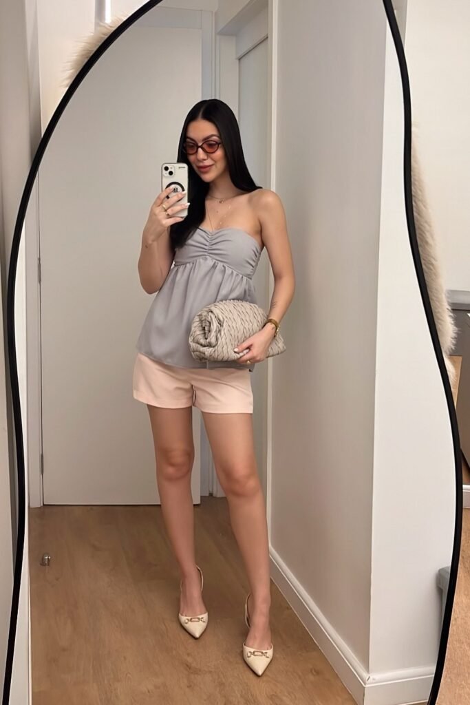 Grey Strapless Ruched Top + Light Pink Tailored Shorts + Cream Pointed-Toe Heels + Beige Woven Clutch