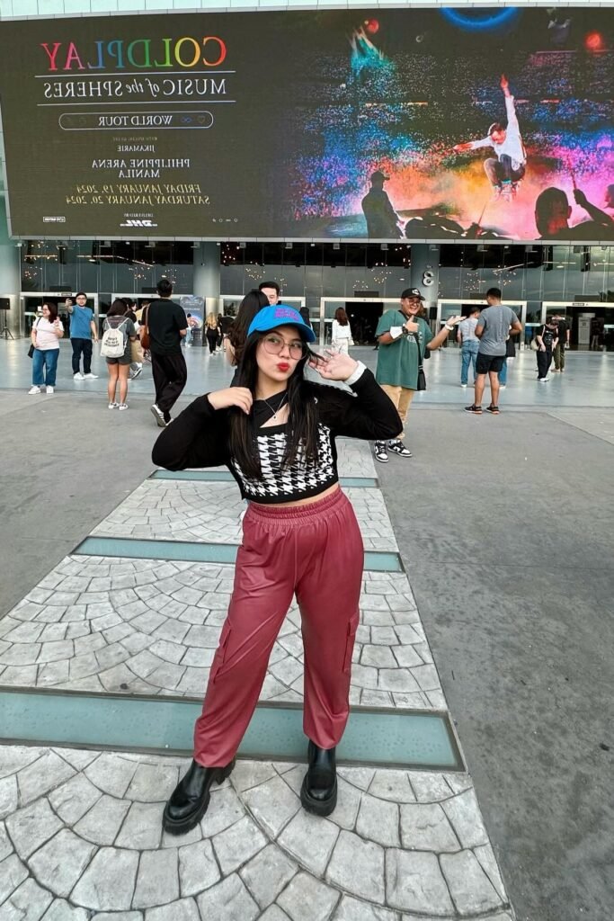 Houndstooth Crop Vest over Black Long-Sleeve Top + Dusty Rose Cargo Joggers + Black Platform Boots + Blue Baseball Cap