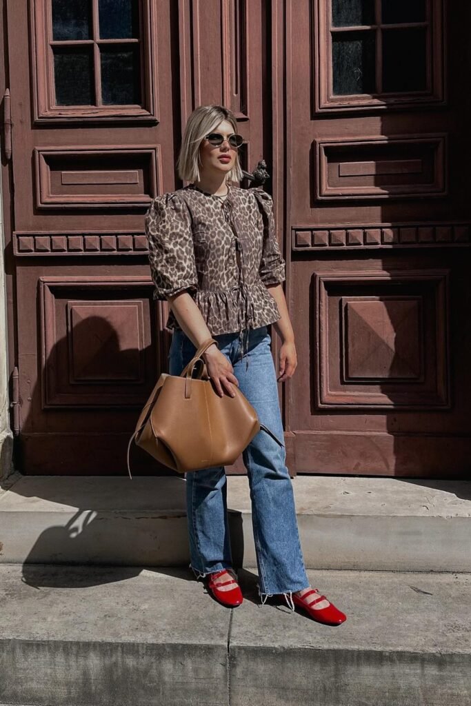Leopard Print Peplum Blouse + Straight Leg Jeans + Large Tan Tote + Red Double Strap Mary Janes