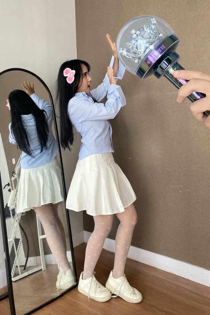 Light Blue Striped Long-Sleeve Shirt + White Pleated Mini Skirt + White Sneakers