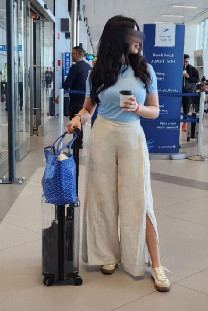 Light Blue T-Shirt + Beige Split-Hem Linen Pants + Tan and White Sneakers