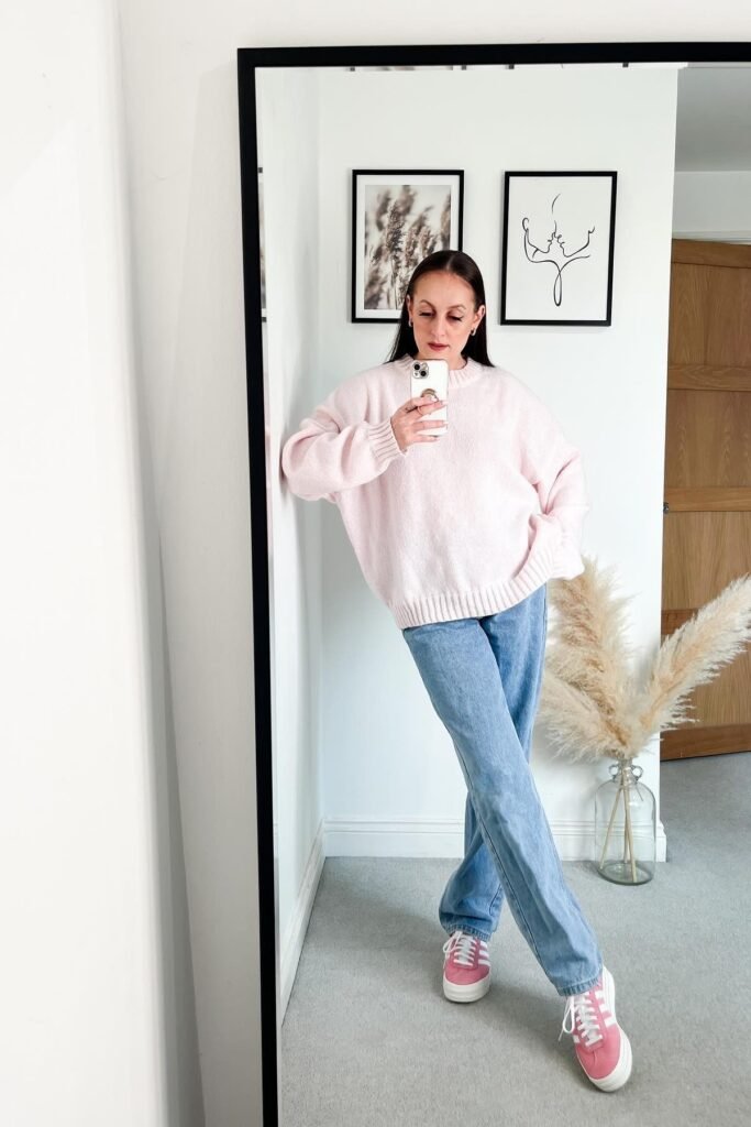 Light Pink Oversized Sweater + Light-Wash Jeans + Pink Sneakers