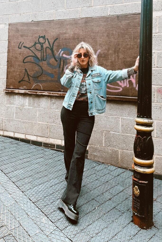 Light Wash Denim Jacket + Graphic T-Shirt + Black Pinstripe Flare Trousers + Black Platform Boots