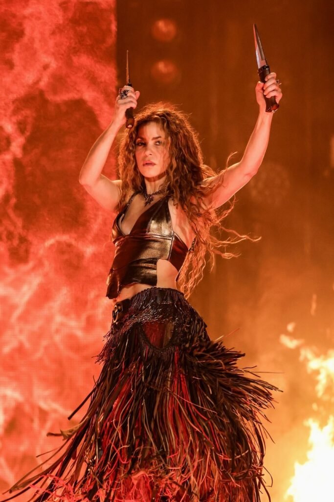 Metallic Bronze Halter Top + Multi-Textured Shredded Fringe Skirt + Black Leather Belt