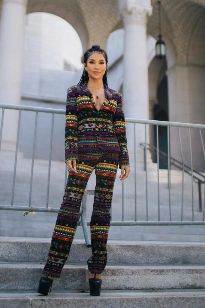 Multi-Colored Patterned Suit + Black Platform Boots + Gold Hoop Earrings