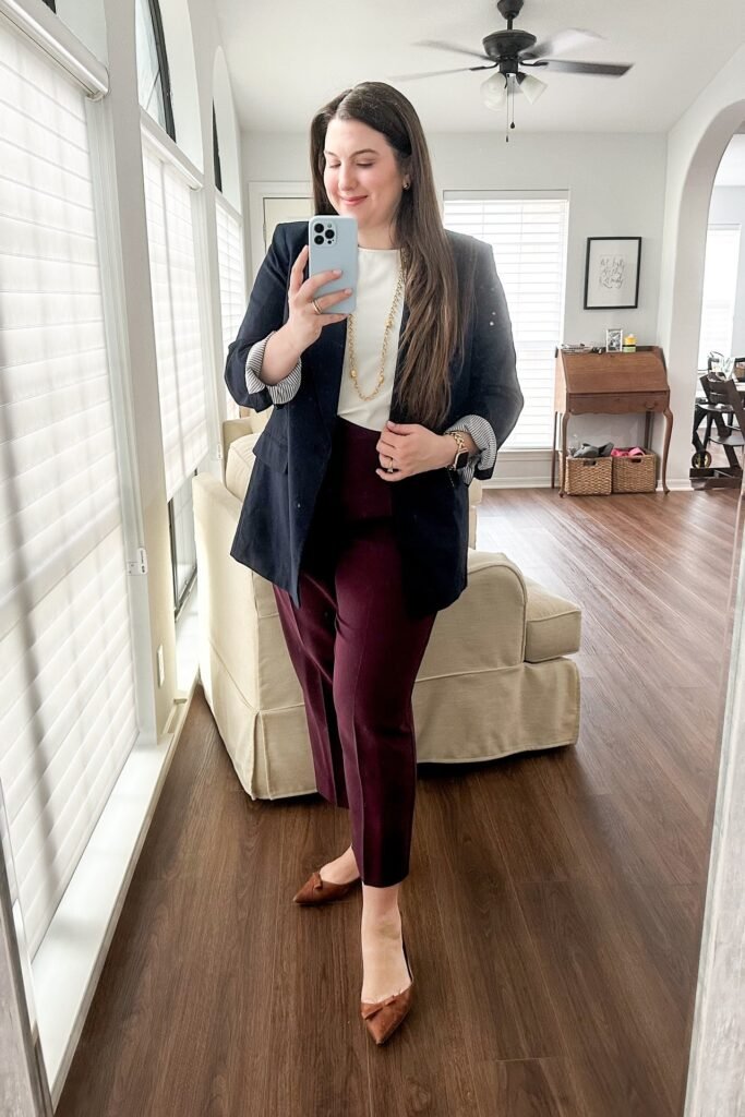 Navy Blazer with Striped Cuffs + White Round-Neck Top + Burgundy Cropped Trousers + Brown Pointed Flats